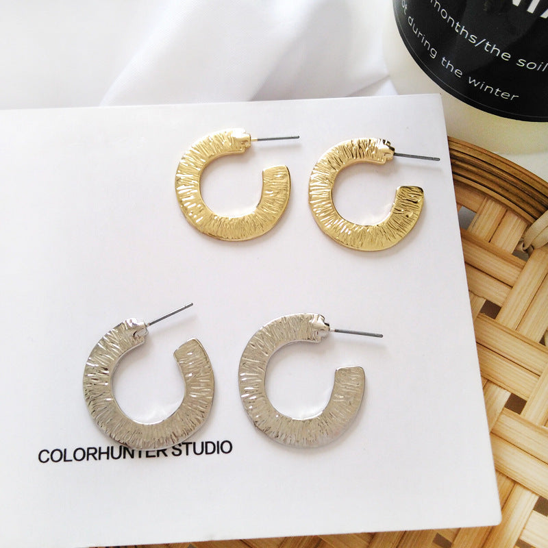 Split semi-circular sequin earrings